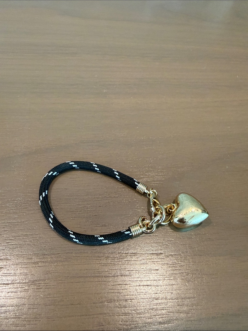 Roxanne Assoulin Black Rope Bracelet with Gold Heart Charm